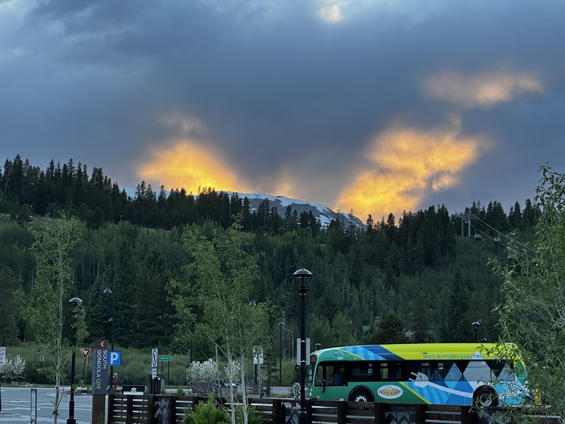 Sunset glow behind the mountains at the Breckenridge gondola